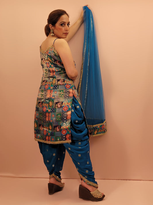 Fabric:&nbsp;Luxurious blue fabric with a vibrant Banarasi multicolor position weave on the kameez.
Kameez:&nbsp;Adorned with intricate Banarasi multicolor position weave, creating an enchanting tapestry of rich hues and patterns.
Pants:&nbsp;Matching embroidered tulip pants that add a modern twist to the classic silhouette.
Dupatta:&nbsp;Delicate net dupatta that drapes gracefully, adding an extra layer of sophistication.