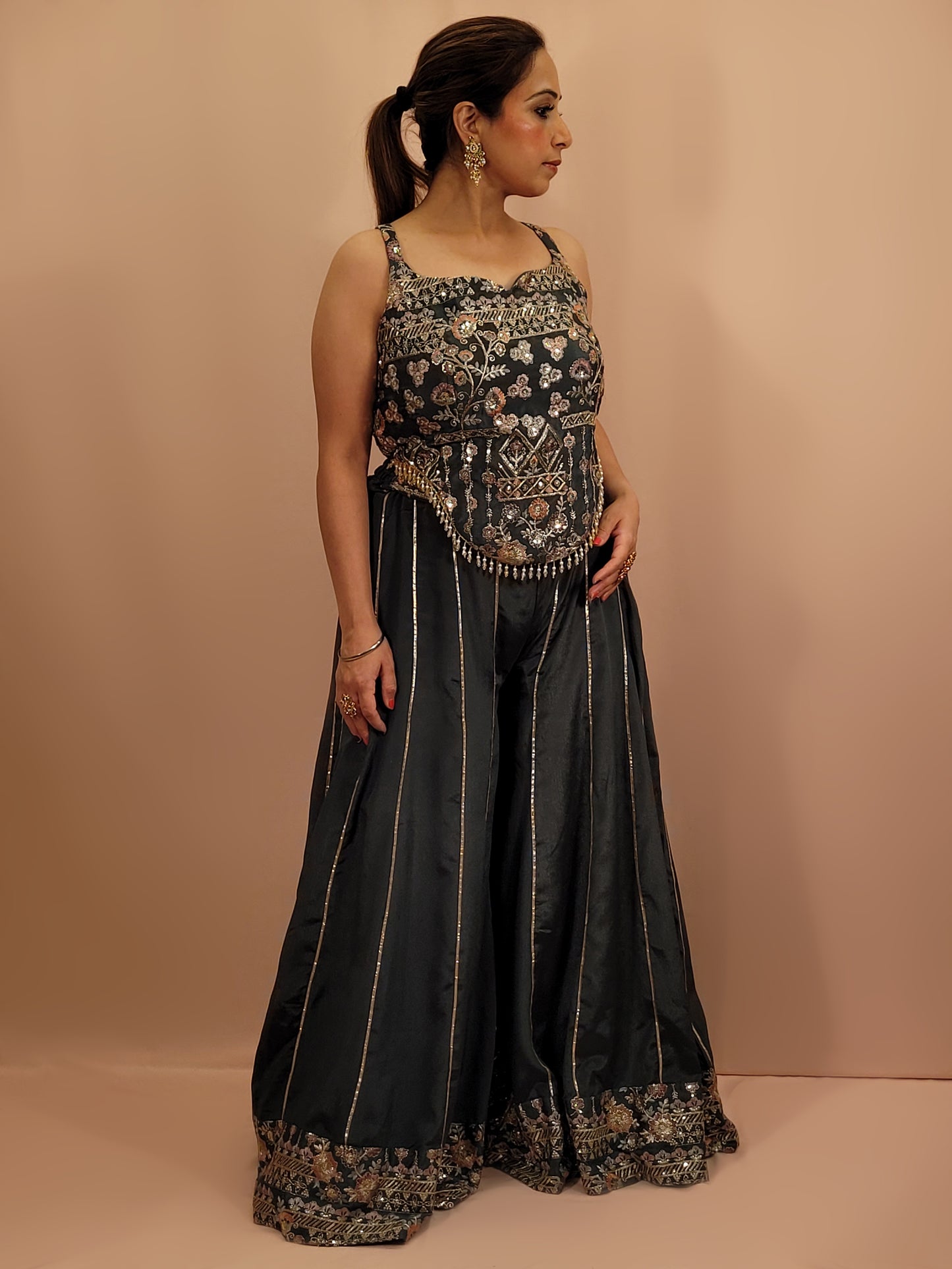Elevate your ethnic wardrobe with this exquisite Cadet Blue Indo-Western Palazzo Dress. This stunning ensemble is perfect for any fashion-forward woman looking to make an impression at weddings, parties, or festive occasions.