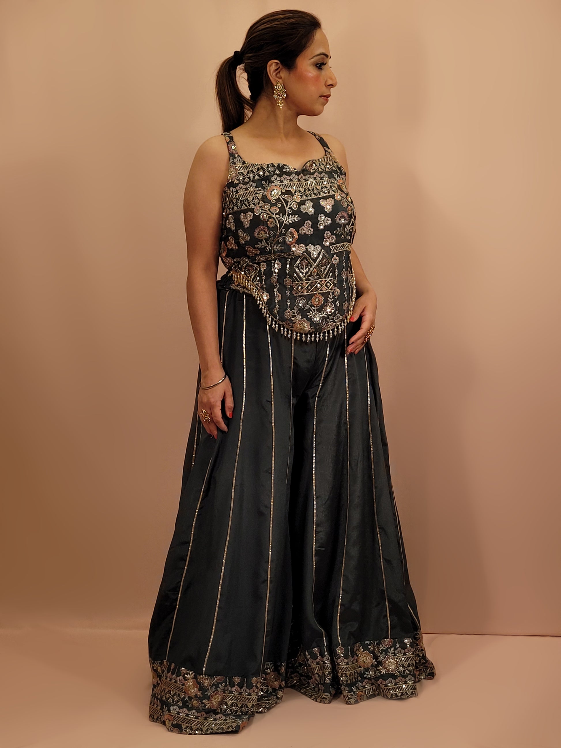 Elevate your ethnic wardrobe with this exquisite Cadet Blue Indo-Western Palazzo Dress. This stunning ensemble is perfect for any fashion-forward woman looking to make an impression at weddings, parties, or festive occasions.