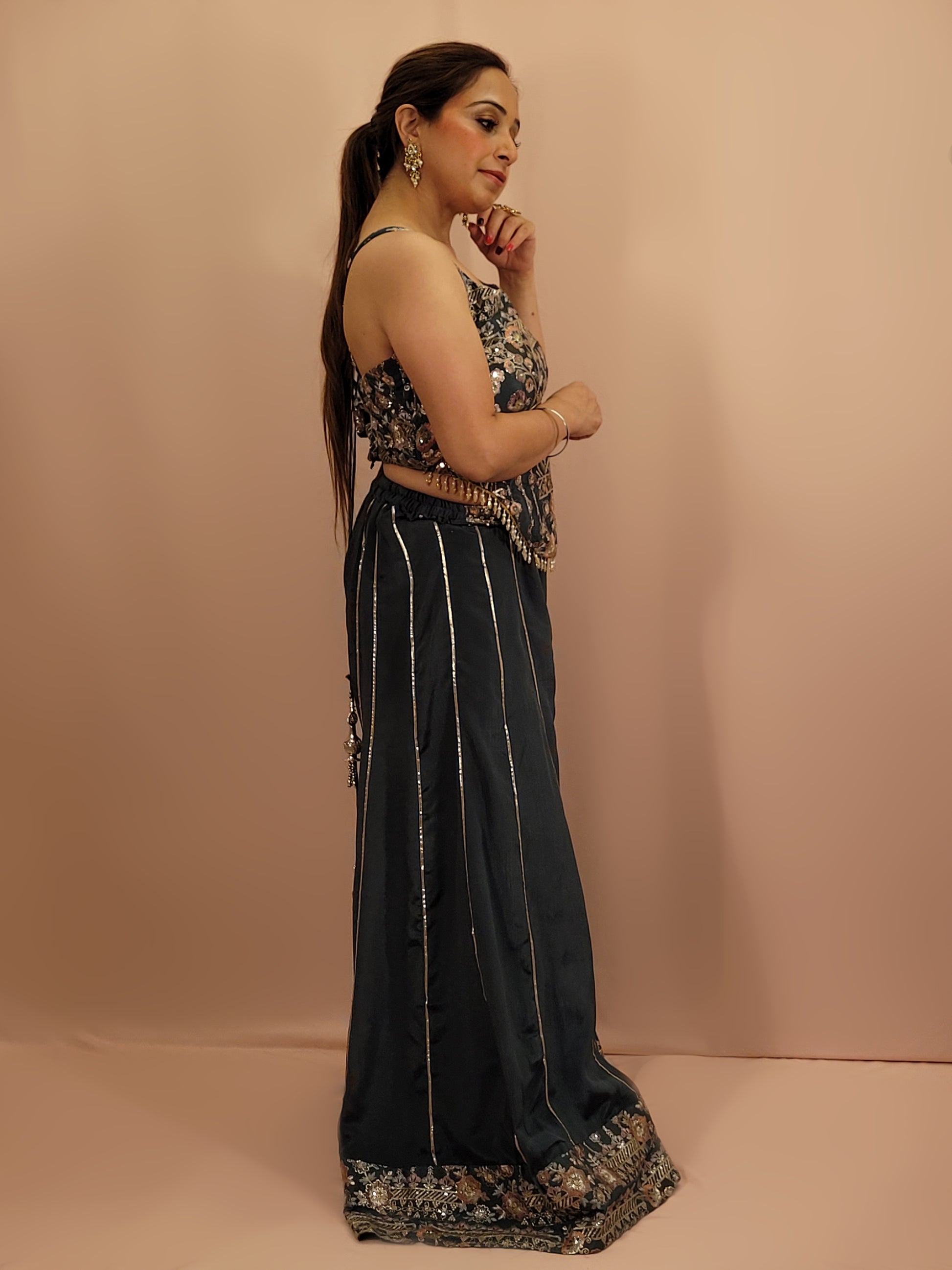 Elevate your ethnic wardrobe with this exquisite Cadet Blue Indo-Western Palazzo Dress. This stunning ensemble is perfect for any fashion-forward woman looking to make an impression at weddings, parties, or festive occasions.