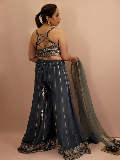 Elevate your ethnic wardrobe with this exquisite Cadet Blue Indo-Western Palazzo Dress. This stunning ensemble is perfect for any fashion-forward woman looking to make an impression at weddings, parties, or festive occasions.