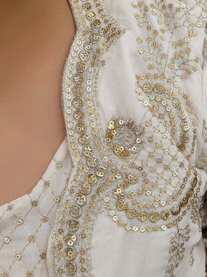 Madhuri Dixit look inspired White Indo Western Set Zari and Sequins work on top pants and shrug. Inspired by designer Nupur Kanoi's look showcased by Madhuri Dixit.