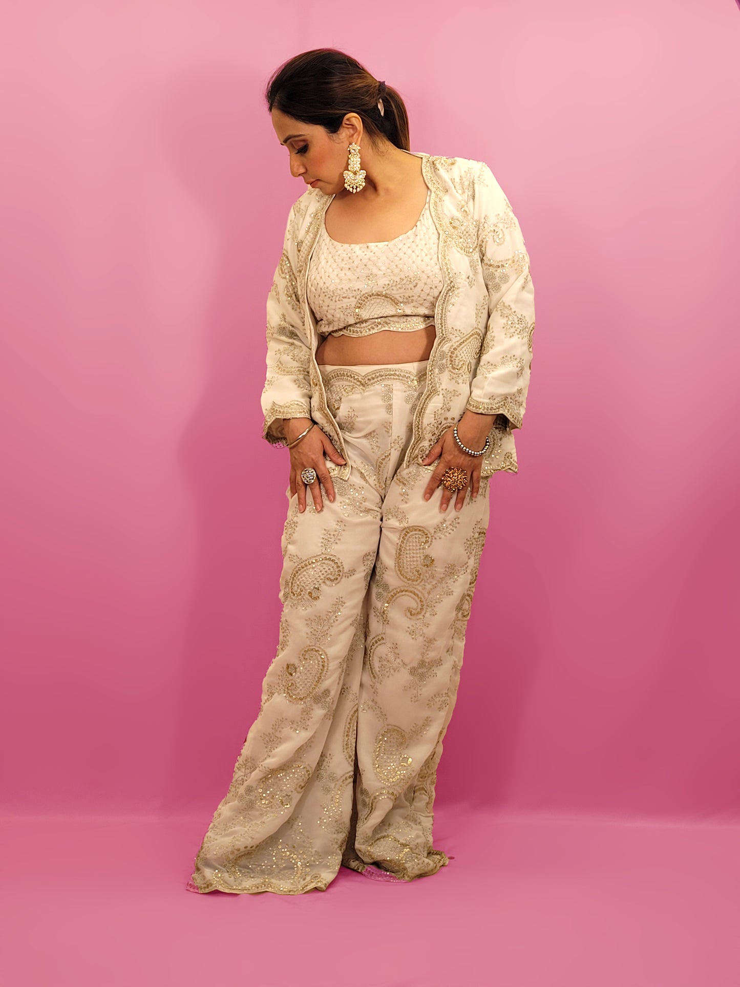 Madhuri Dixit look inspired White Indo Western Set Zari and Sequins work on top pants and shrug. Inspired by designer Nupur Kanoi's look showcased by Madhuri Dixit.