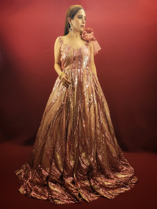 Step into your fairytale with our imported Gajri Pink Bridal Gown, adorned with sequins, beads and crystal flower on the shoulder, perfect for your engagement, cocktail or wedding day.