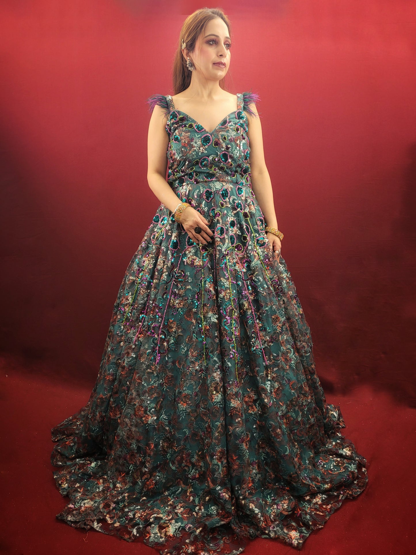 Elevate your special occasions with our Rama Green Cocktail Gown, featuring a lavish display of beads and sequins on imported fabric, ideal for engagement and reception celebrations.