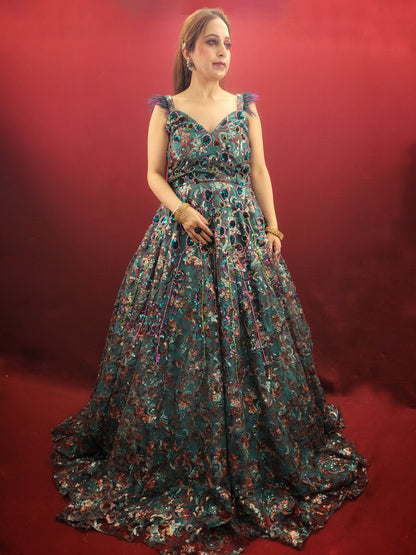 Elevate your special occasions with our Rama Green Cocktail Gown, featuring a lavish display of beads and sequins on imported fabric, ideal for engagement and reception celebrations.