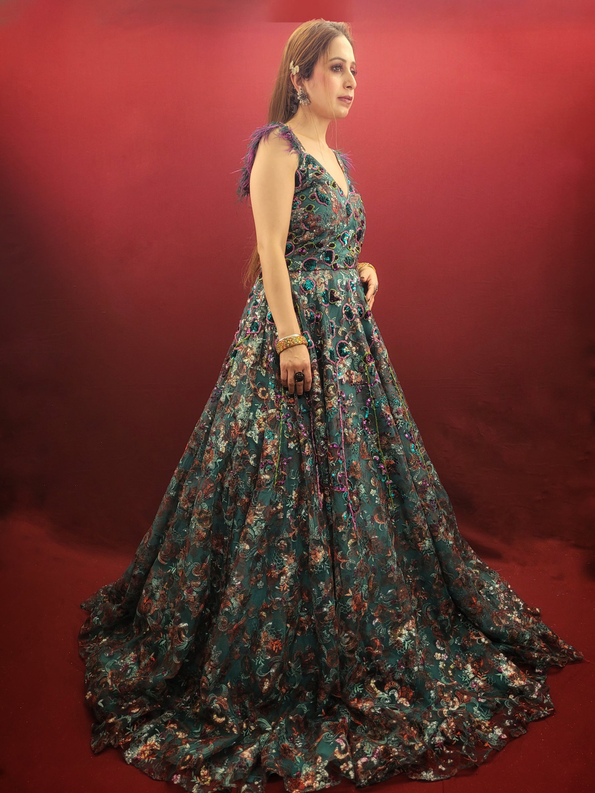 Elevate your special occasions with our Rama Green Cocktail Gown, featuring a lavish display of beads and sequins on imported fabric, ideal for engagement and reception celebrations.