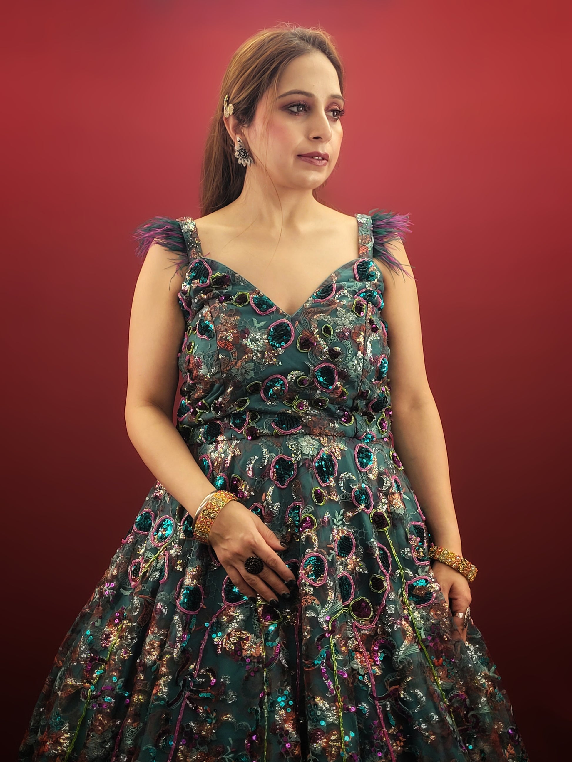 Elevate your special occasions with our Rama Green Cocktail Gown, featuring a lavish display of beads and sequins on imported fabric, ideal for engagement and reception celebrations.