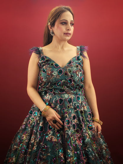 Elevate your special occasions with our Rama Green Cocktail Gown, featuring a lavish display of beads and sequins on imported fabric, ideal for engagement and reception celebrations.