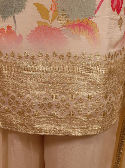 Creme chinon floral print kurti palazzo set. Cutdana, zarkan and dabka work.
