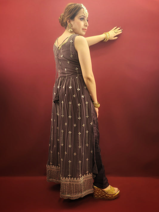Step into a world of traditional charm with an antique fuchsia Nayra Kameez Pant Set, featuring a sparkle of sequins work, perfect for any ethnic fusion wardrobe.
