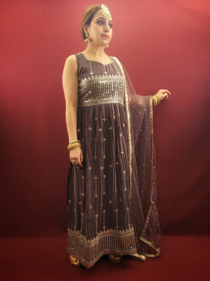 Step into a world of traditional charm with an antique fuchsia Nayra Kameez Pant Set, featuring a sparkle of sequins work, perfect for any ethnic fusion wardrobe.