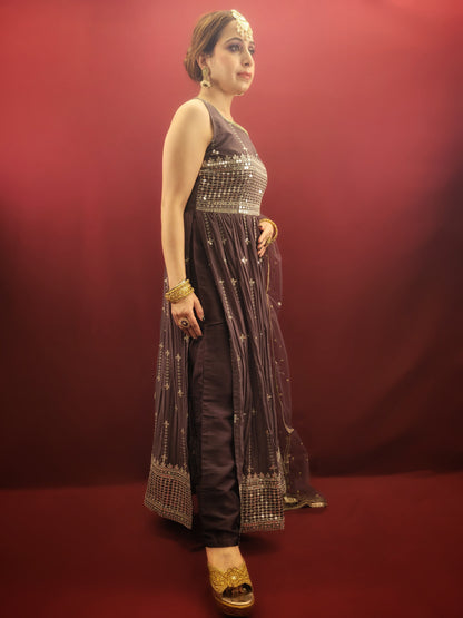 Step into a world of traditional charm with an antique fuchsia Nayra Kameez Pant Set, featuring a sparkle of sequins work, perfect for any ethnic fusion wardrobe.