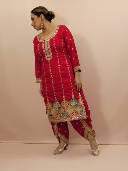 Red Embroidered Salwar Kameez Set, a perfect blend of tradition and modernity. This exquisite ensemble features a radiant Red kameez adorned with intricate embroidery and sparkling dori-sequins work around the neckline and hemline. The vibrant patterns in multiple colors add a touch of festivity and charm, making it ideal for any special occasion.