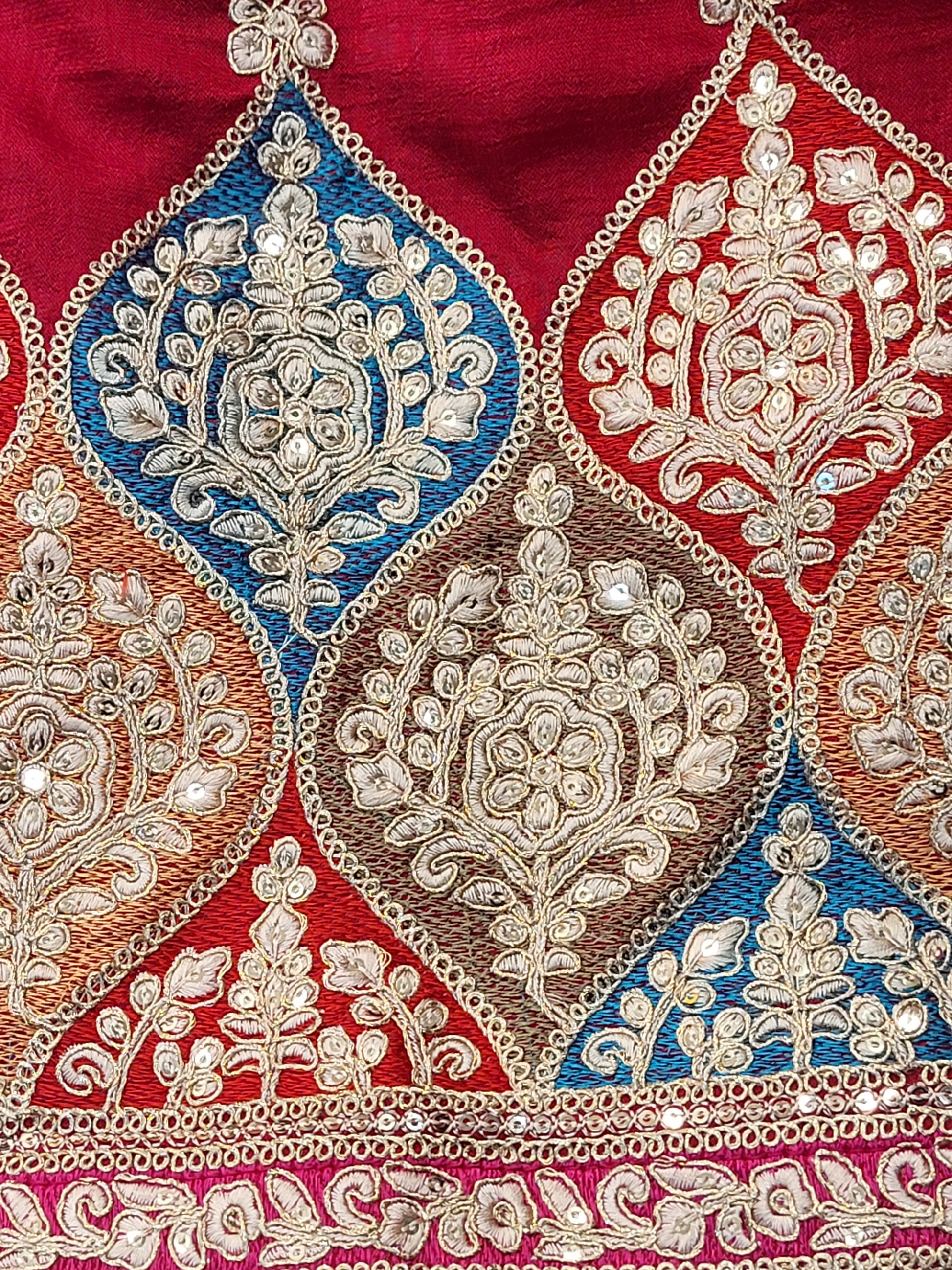 Red Embroidered Salwar Kameez Set, a perfect blend of tradition and modernity. This exquisite ensemble features a radiant Red kameez adorned with intricate embroidery and sparkling dori-sequins work around the neckline and hemline. The vibrant patterns in multiple colors add a touch of festivity and charm, making it ideal for any special occasion.