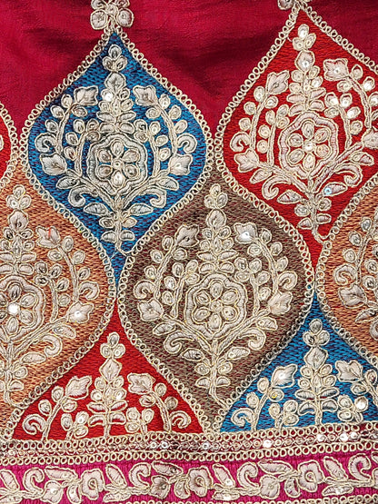 Red Embroidered Salwar Kameez Set, a perfect blend of tradition and modernity. This exquisite ensemble features a radiant Red kameez adorned with intricate embroidery and sparkling dori-sequins work around the neckline and hemline. The vibrant patterns in multiple colors add a touch of festivity and charm, making it ideal for any special occasion.