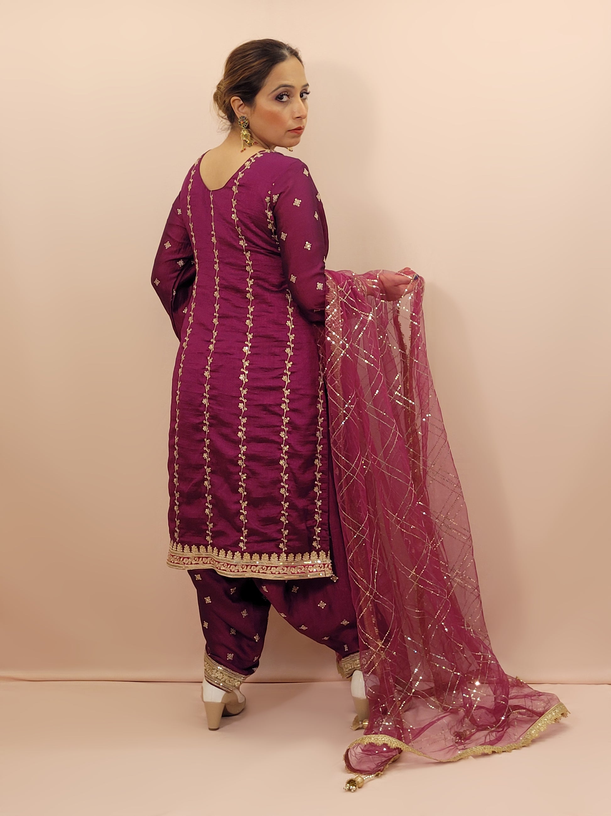 Step into elegance with our stunning Purple Embroidered Salwar Kameez Set, a perfect blend of tradition and modernity. This exquisite ensemble features a radiant Purple kameez adorned with intricate embroidery and sparkling dori-sequins work around the neckline and hemline. The vibrant patterns in multiple colors add a touch of festivity and charm, making it ideal for any special occasion.
