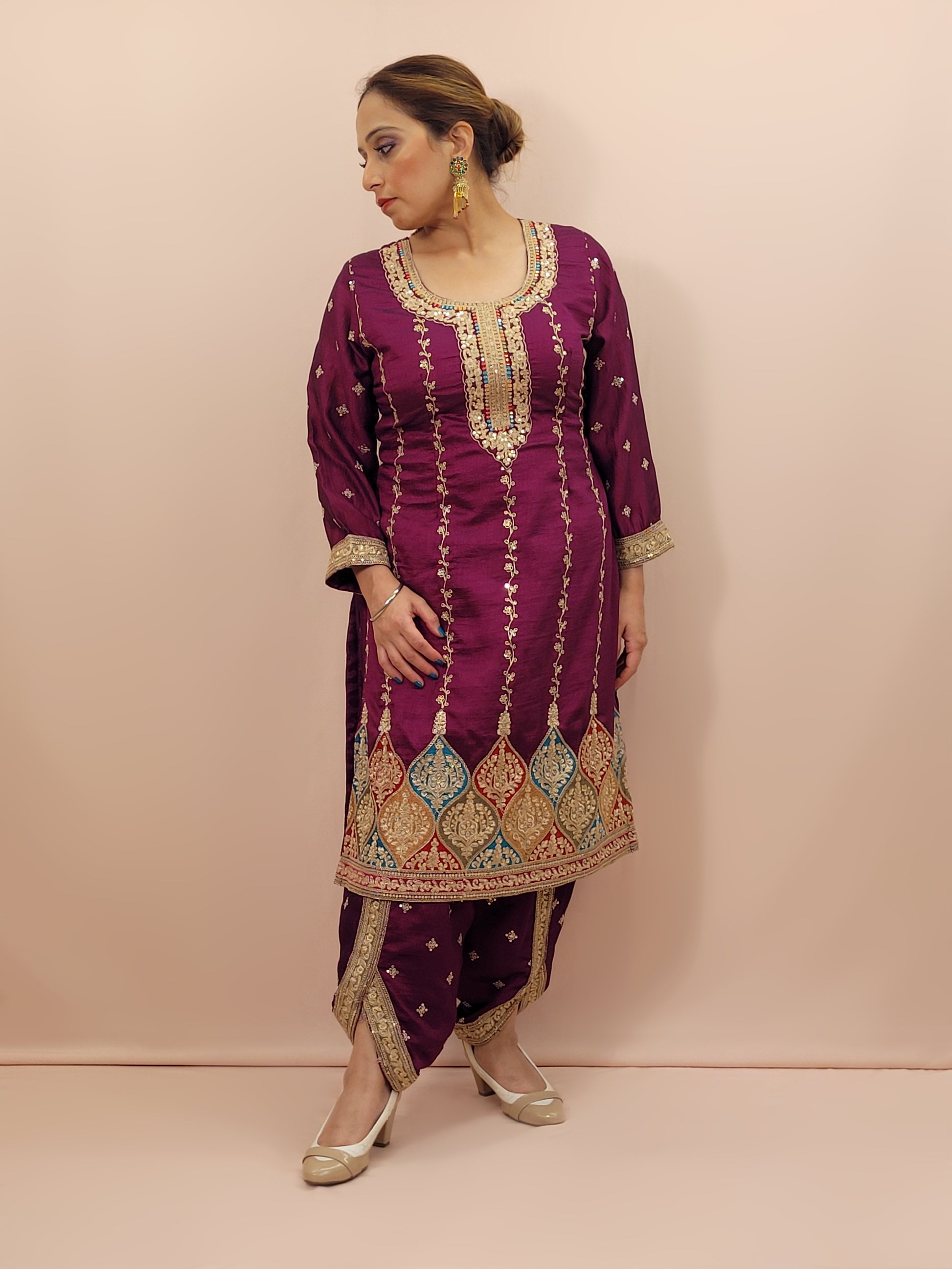 Step into elegance with our stunning Purple Embroidered Salwar Kameez Set, a perfect blend of tradition and modernity. This exquisite ensemble features a radiant Purple kameez adorned with intricate embroidery and sparkling dori-sequins work around the neckline and hemline. The vibrant patterns in multiple colors add a touch of festivity and charm, making it ideal for any special occasion.