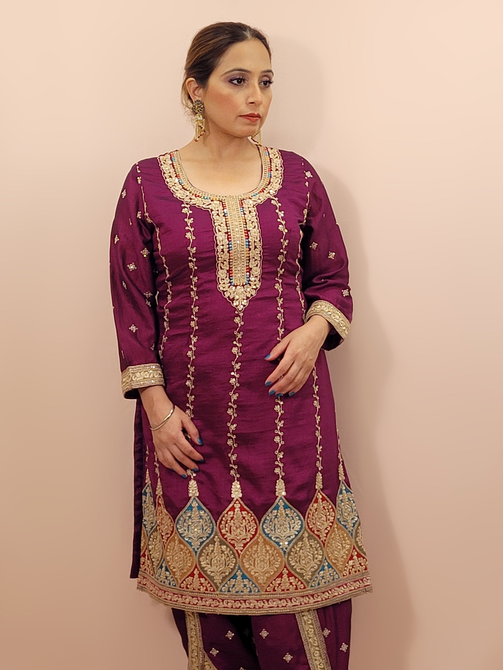 Step into elegance with our stunning Purple Embroidered Salwar Kameez Set, a perfect blend of tradition and modernity. This exquisite ensemble features a radiant Purple kameez adorned with intricate embroidery and sparkling dori-sequins work around the neckline and hemline. The vibrant patterns in multiple colors add a touch of festivity and charm, making it ideal for any special occasion.