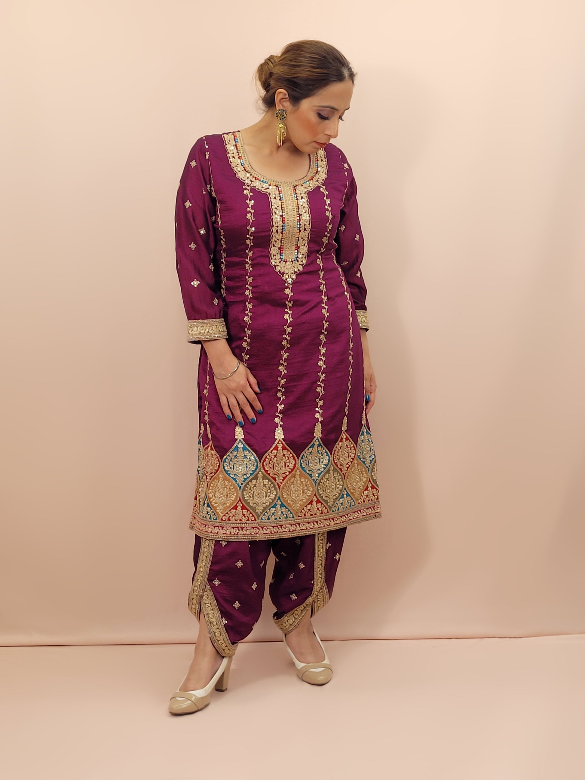 Step into elegance with our stunning Purple Embroidered Salwar Kameez Set, a perfect blend of tradition and modernity. This exquisite ensemble features a radiant Purple kameez adorned with intricate embroidery and sparkling dori-sequins work around the neckline and hemline. The vibrant patterns in multiple colors add a touch of festivity and charm, making it ideal for any special occasion.