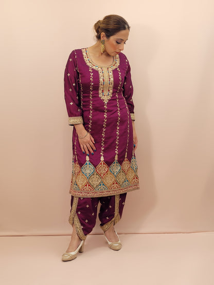 Step into elegance with our stunning Purple Embroidered Salwar Kameez Set, a perfect blend of tradition and modernity. This exquisite ensemble features a radiant Purple kameez adorned with intricate embroidery and sparkling dori-sequins work around the neckline and hemline. The vibrant patterns in multiple colors add a touch of festivity and charm, making it ideal for any special occasion.