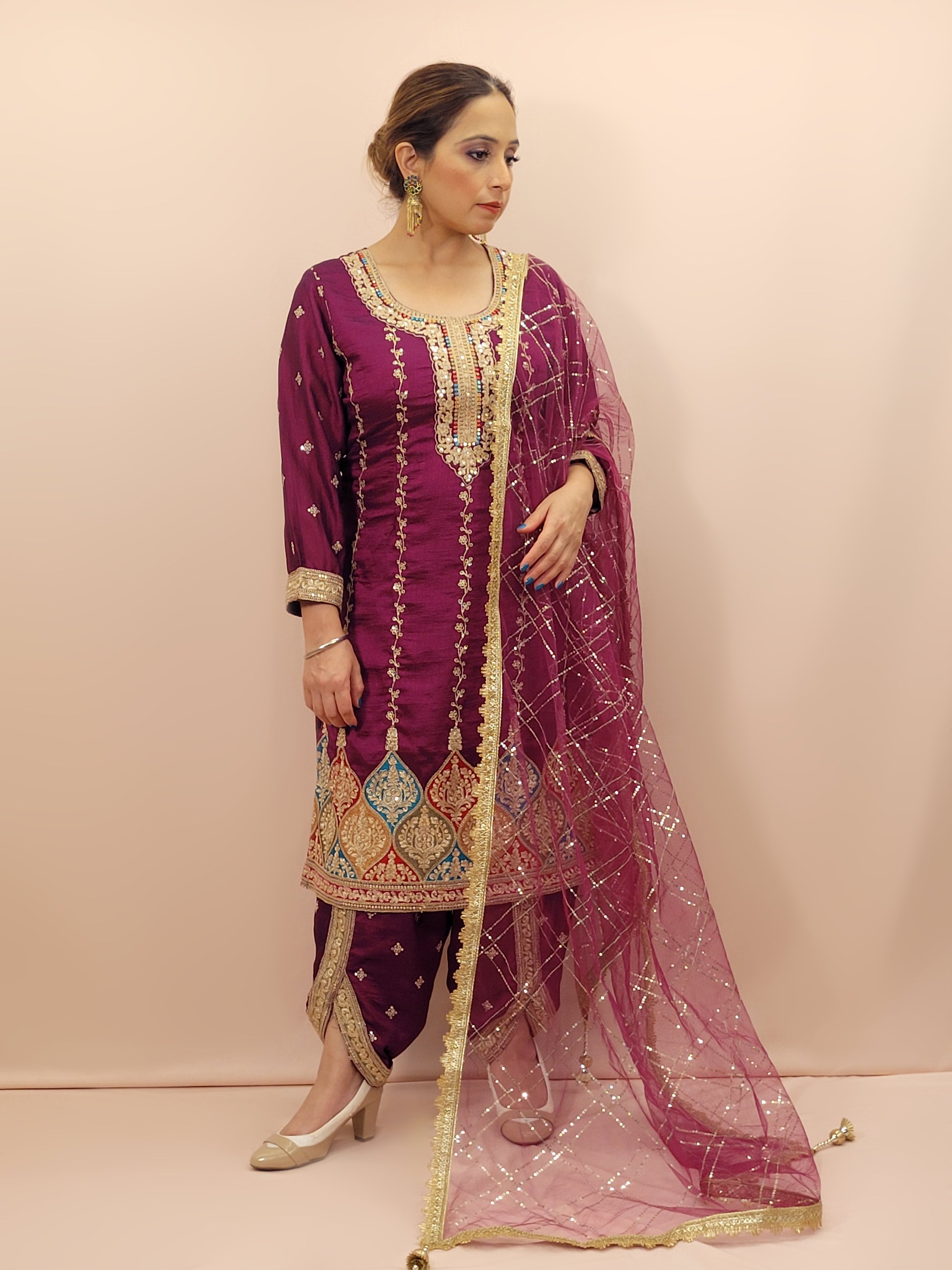 Step into elegance with our stunning Purple Embroidered Salwar Kameez Set, a perfect blend of tradition and modernity. This exquisite ensemble features a radiant Purple kameez adorned with intricate embroidery and sparkling dori-sequins work around the neckline and hemline. The vibrant patterns in multiple colors add a touch of festivity and charm, making it ideal for any special occasion.