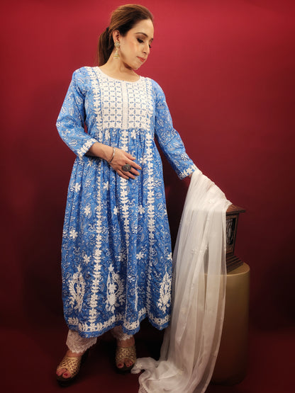 Embrace effortless style with the Floral Chikankari Anarkali Kurti Set, a versatile piece that transitions seamlessly from casual outings to office wear and summer parties. The stunning blue cotton base is adorned with a delicate floral print, further accentuated by intricate chikankari embroidery.