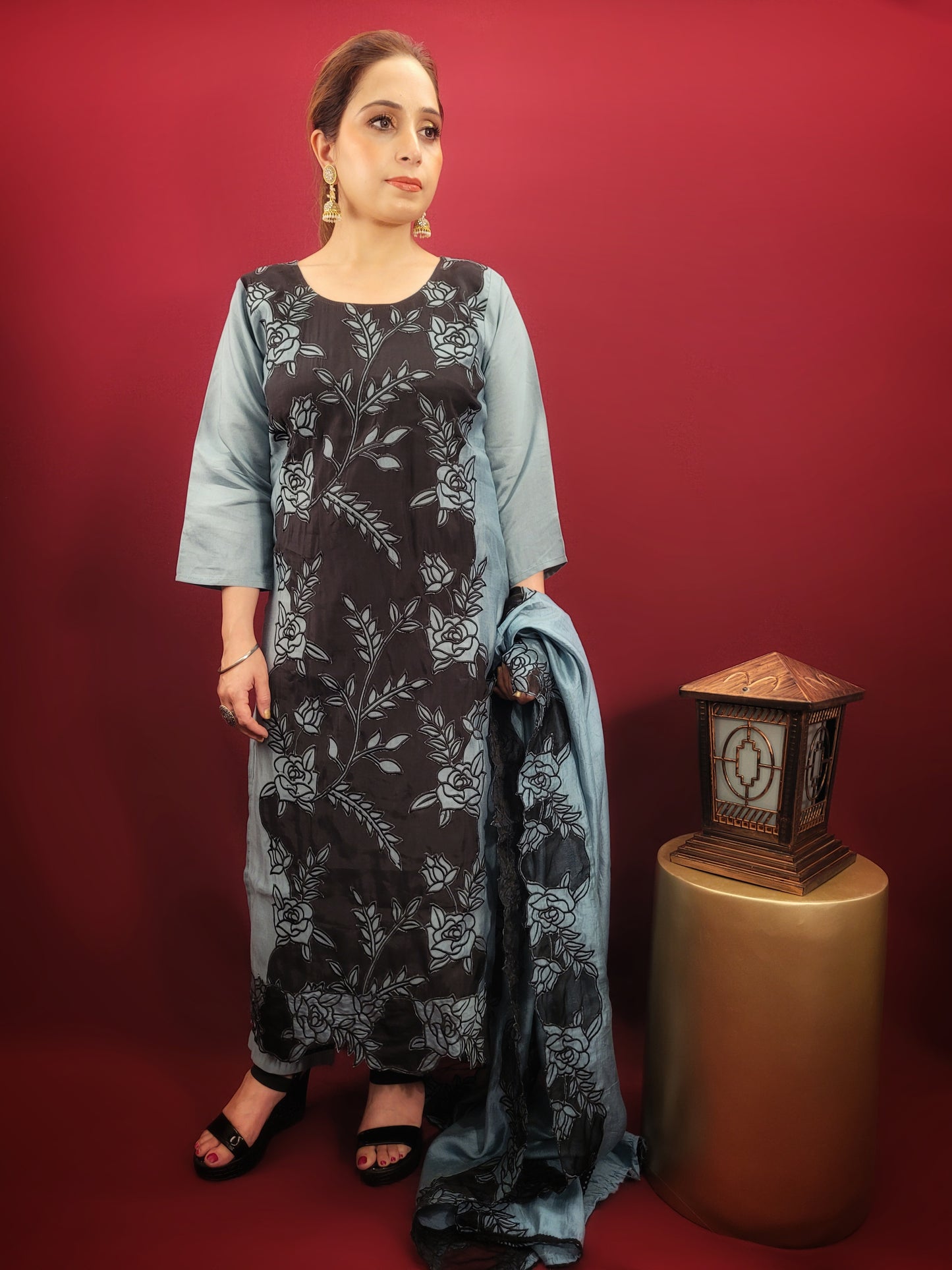 Embrace contemporary elegance with this stunning grey and black kurti pant dupatta set, perfect for light parties and festive soirees. This captivating ensemble features a unique interplay of colors and textures, making a bold statement without compromising on comfort.