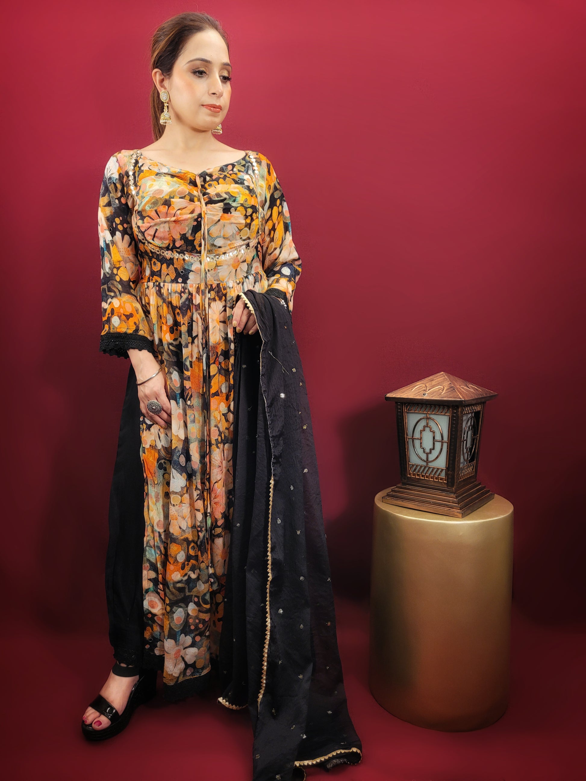 Make a dazzling statement in this stunning Alia Cut Suit Set, perfect for light parties and festive occasions. The vibrant multicolor digital print on a black Georgette base creates a mesmerizing look that will turn heads wherever you go.