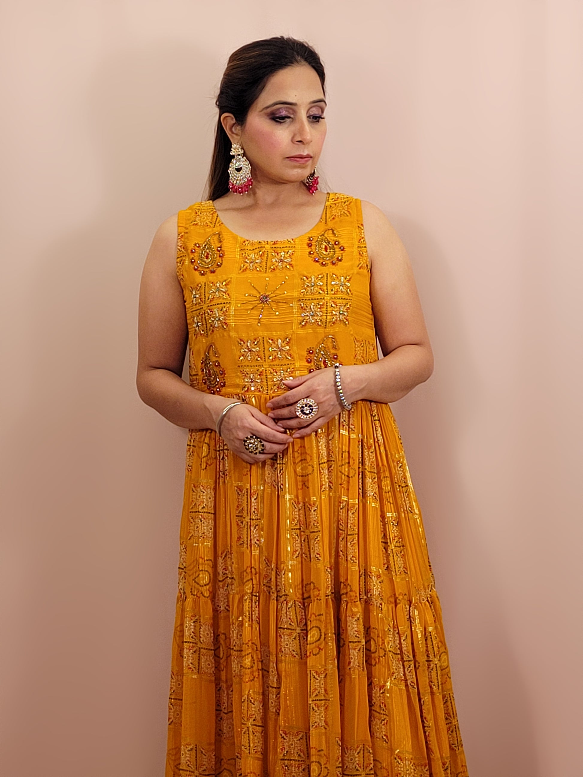 Yellow Chiffon Light-Weight Gown with Multicolor Print. Highlighted with beads work.
