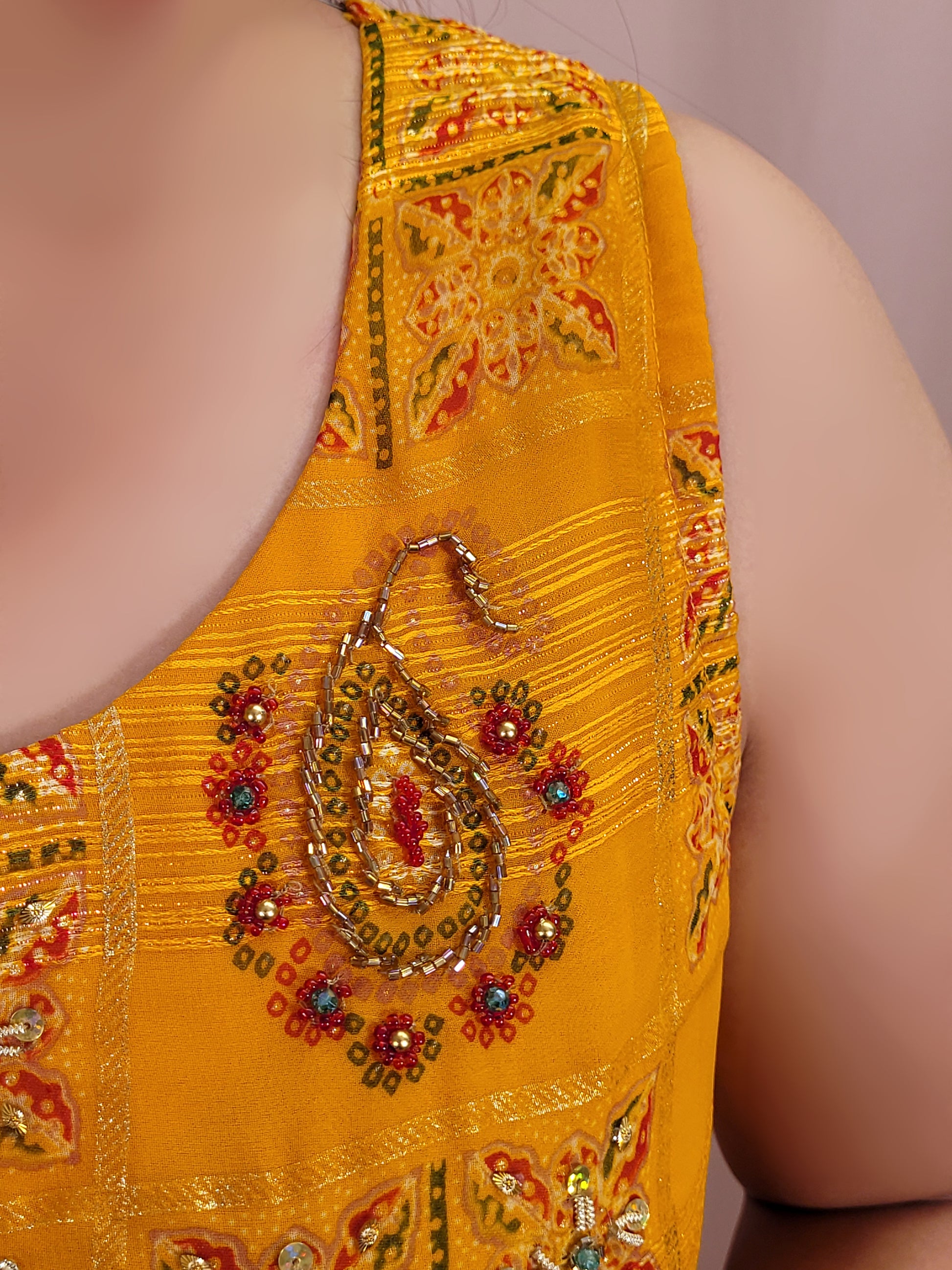 Yellow Chiffon Light-Weight Gown with Multicolor Print. Highlighted with beads work.