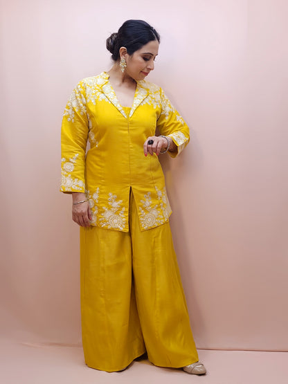 Yellow Indo Western Palazzo Dress. White Resham embroidery on collar, sleeves and daaman. Great choice for Haldi function.