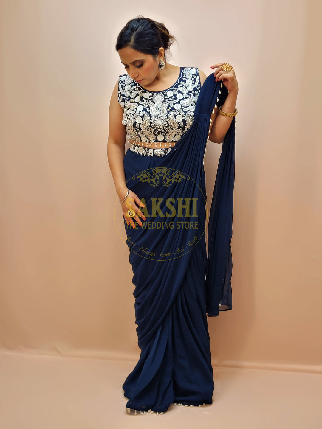 Designer Blue Drape Saree with Heavy Embroidered Blouse.