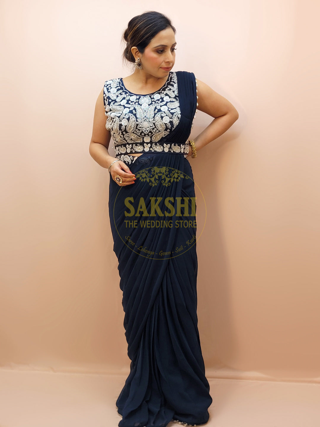 Designer Blue Drape Saree with Heavy Embroidered Blouse.