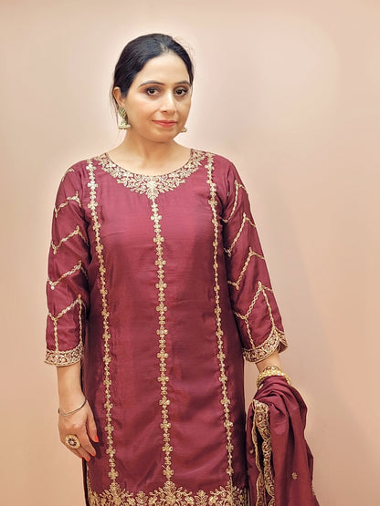 Heavy Embroidered Punjabi Sharara Suit. Zari embroidery on kurti sleeves. Embroidered sharara and dupatta.