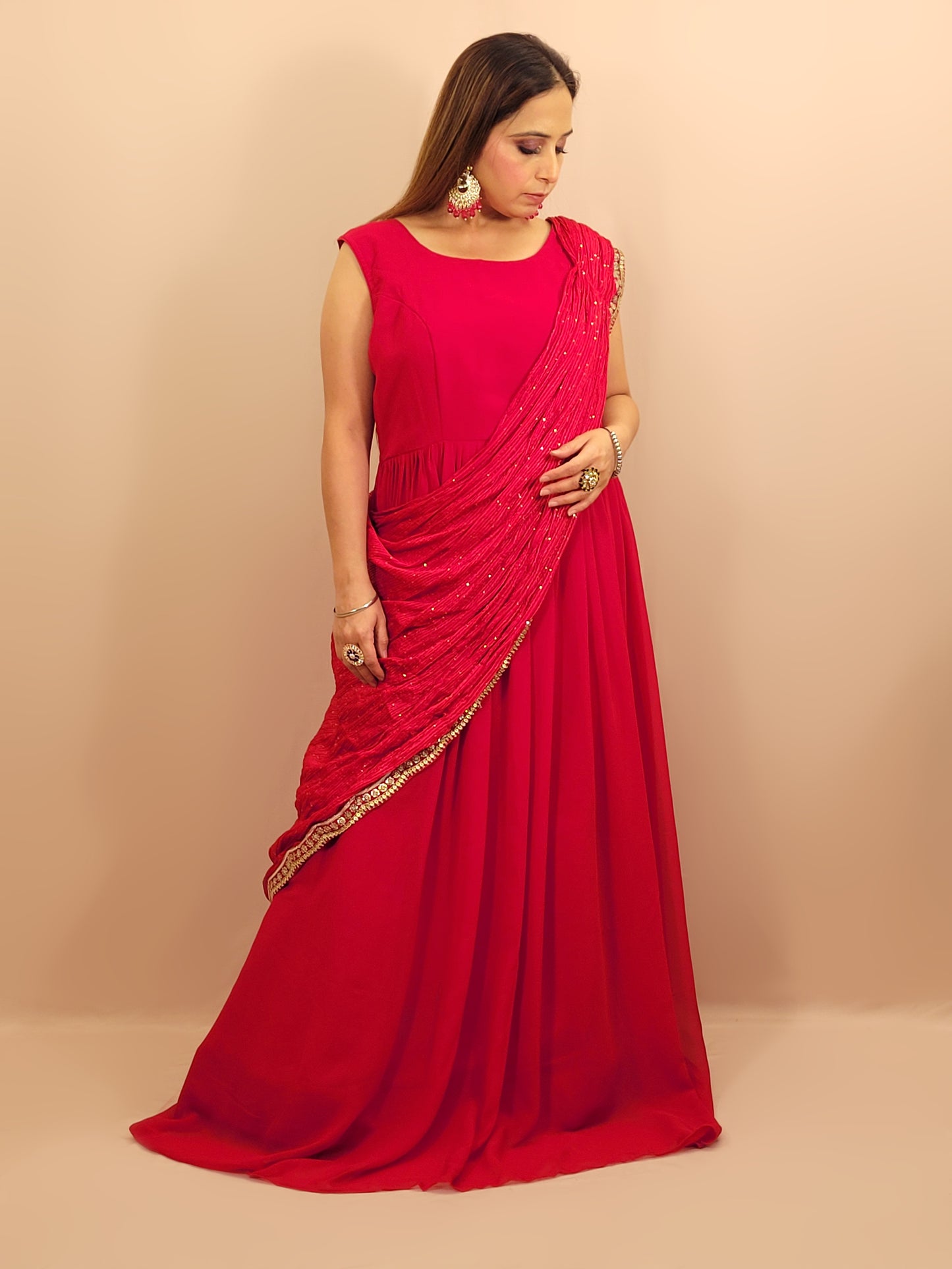Red &nbsp;Georgette Gown with Saree Drape and Designer Shrug.Chinnon Drape. Heavy embroidered shrug with muticolor resham work enhanced with sequins and beads.