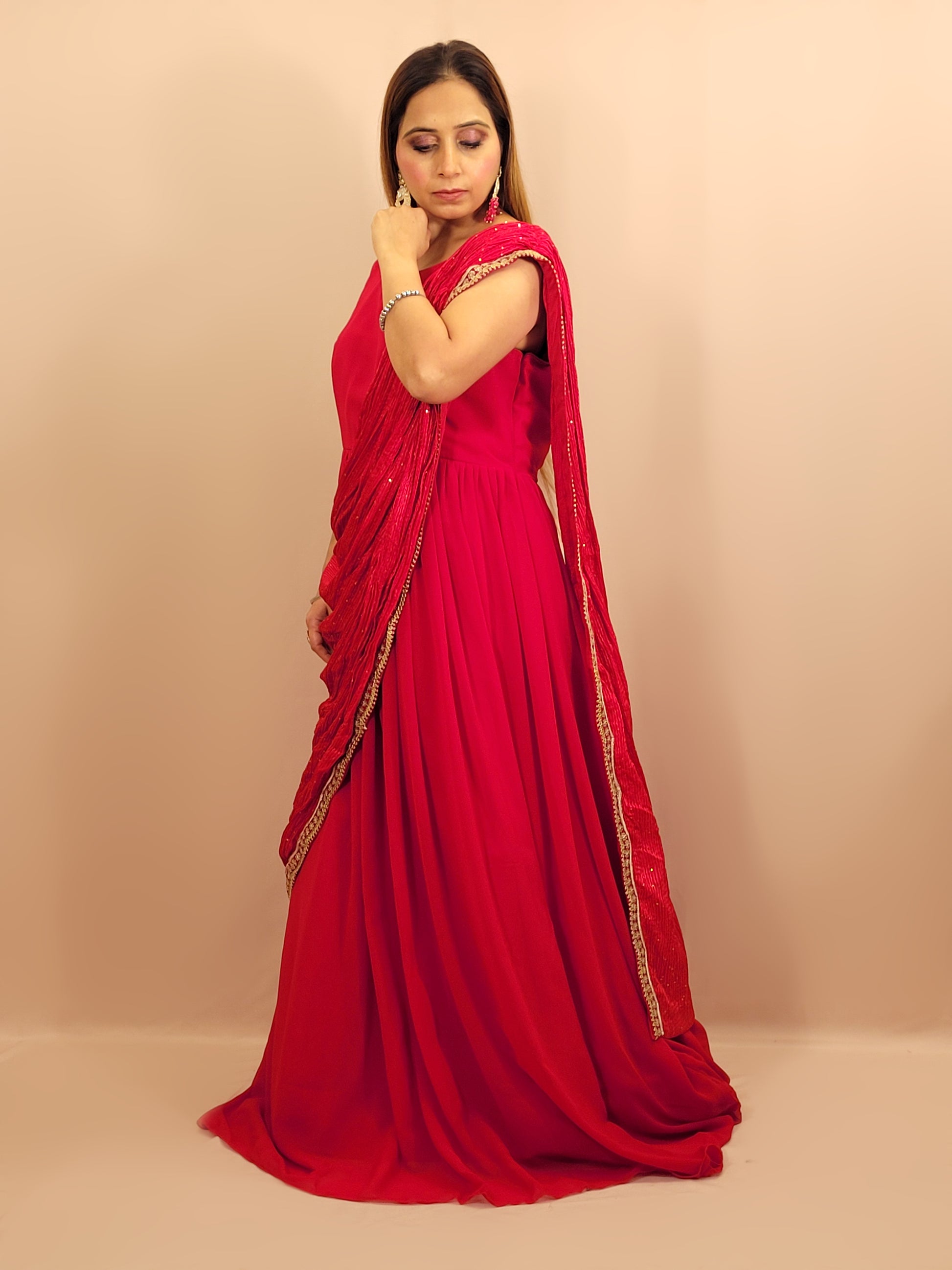 Red &nbsp;Georgette Gown with Saree Drape and Designer Shrug.Chinnon Drape. Heavy embroidered shrug with muticolor resham work enhanced with sequins and beads.