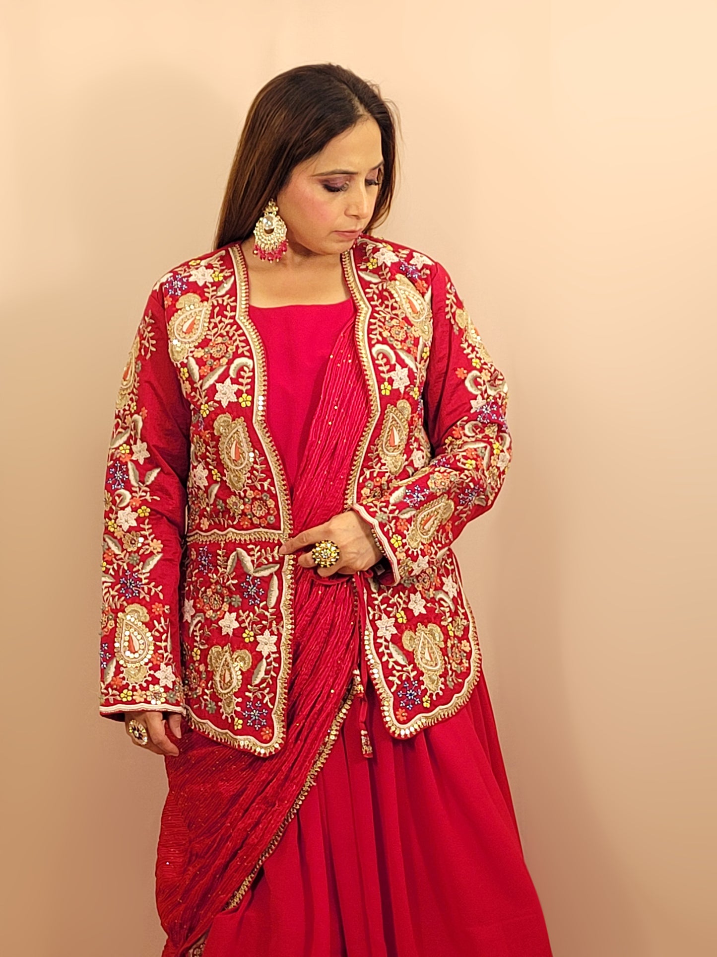 Red &nbsp;Georgette Gown with Saree Drape and Designer Shrug.Chinnon Drape. Heavy embroidered shrug with muticolor resham work enhanced with sequins and beads.