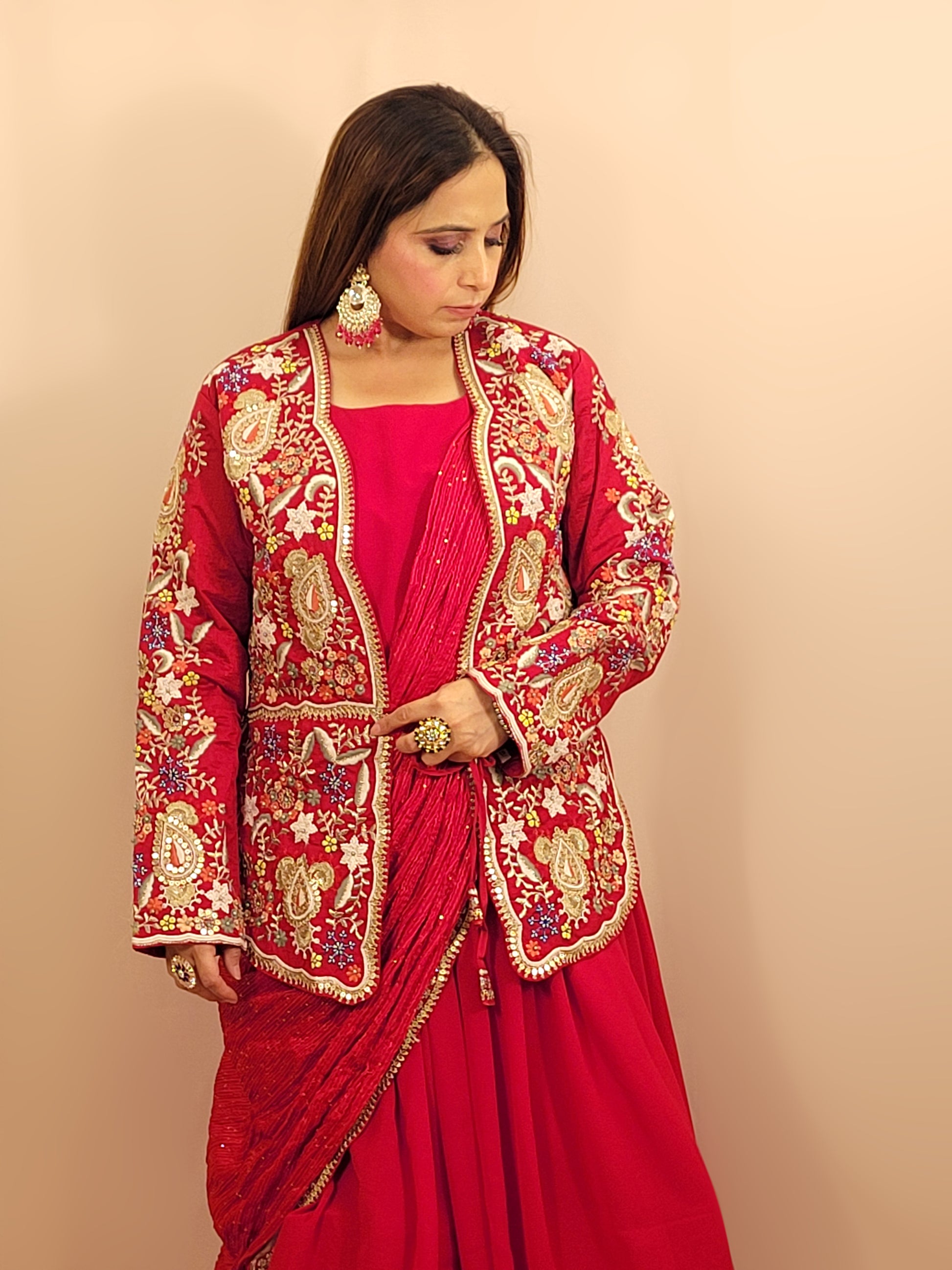 Red &nbsp;Georgette Gown with Saree Drape and Designer Shrug.Chinnon Drape. Heavy embroidered shrug with muticolor resham work enhanced with sequins and beads.