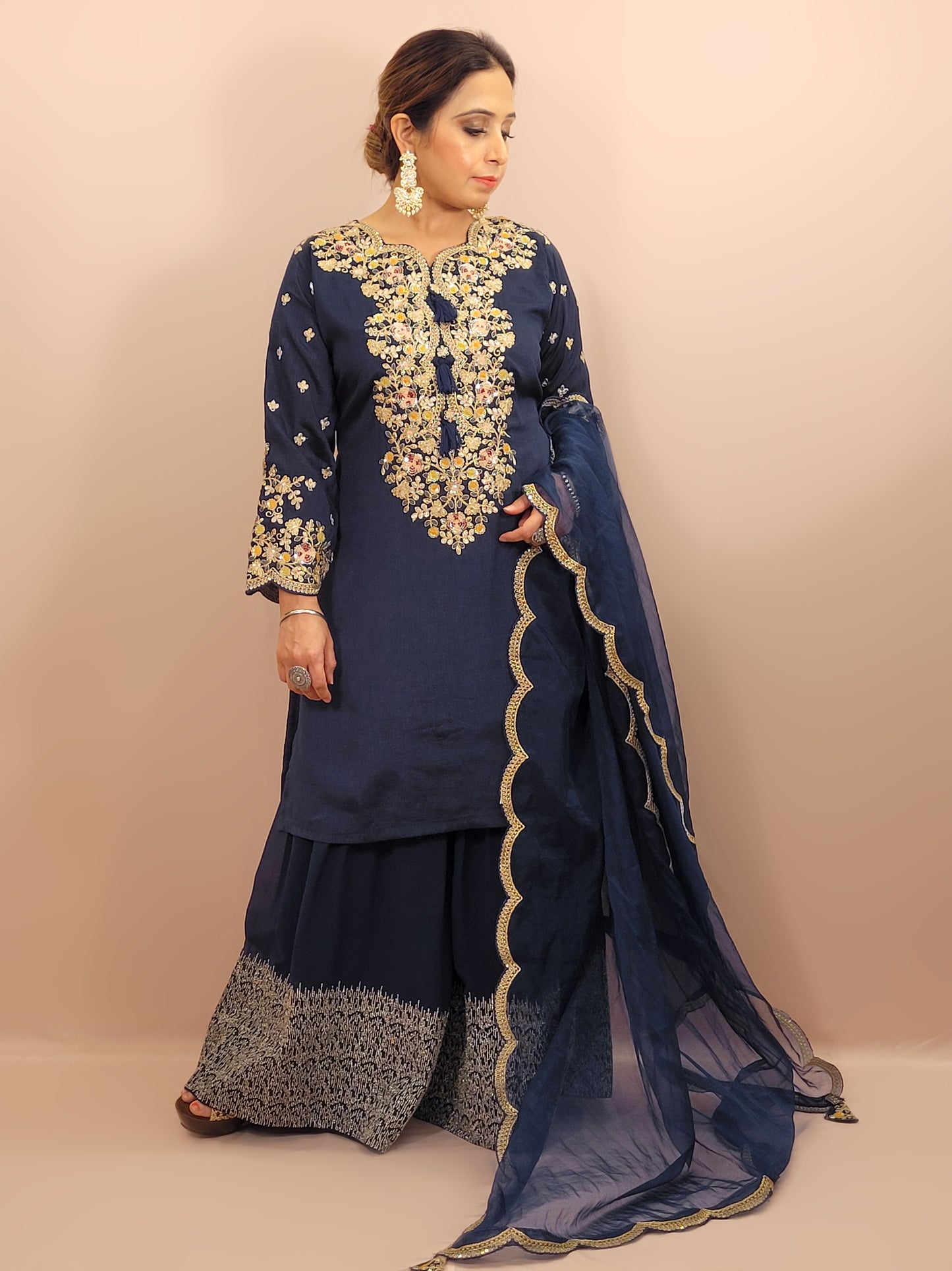 Navy Blue sharara suit with zari, sequins and resham neckline. Bichitra Silk Kameez. Organza Dupatta with Scalloping Border. Georgette Sharara Work.