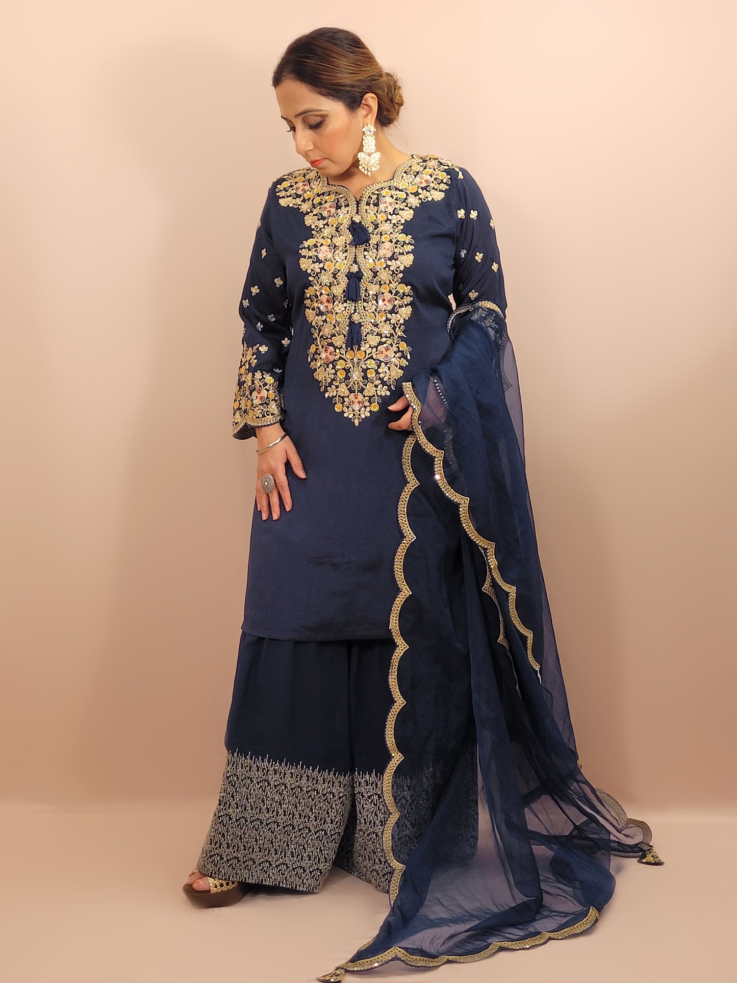 Navy Blue sharara suit with zari, sequins and resham neckline. Bichitra Silk Kameez. Organza Dupatta with Scalloping Border. Georgette Sharara Work.