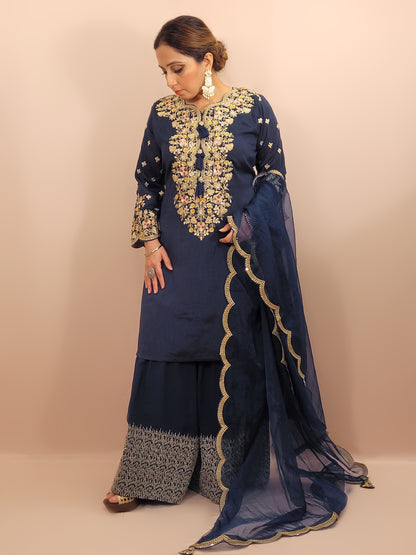 Navy Blue sharara suit with zari, sequins and resham neckline. Bichitra Silk Kameez. Organza Dupatta with Scalloping Border. Georgette Sharara Work.
