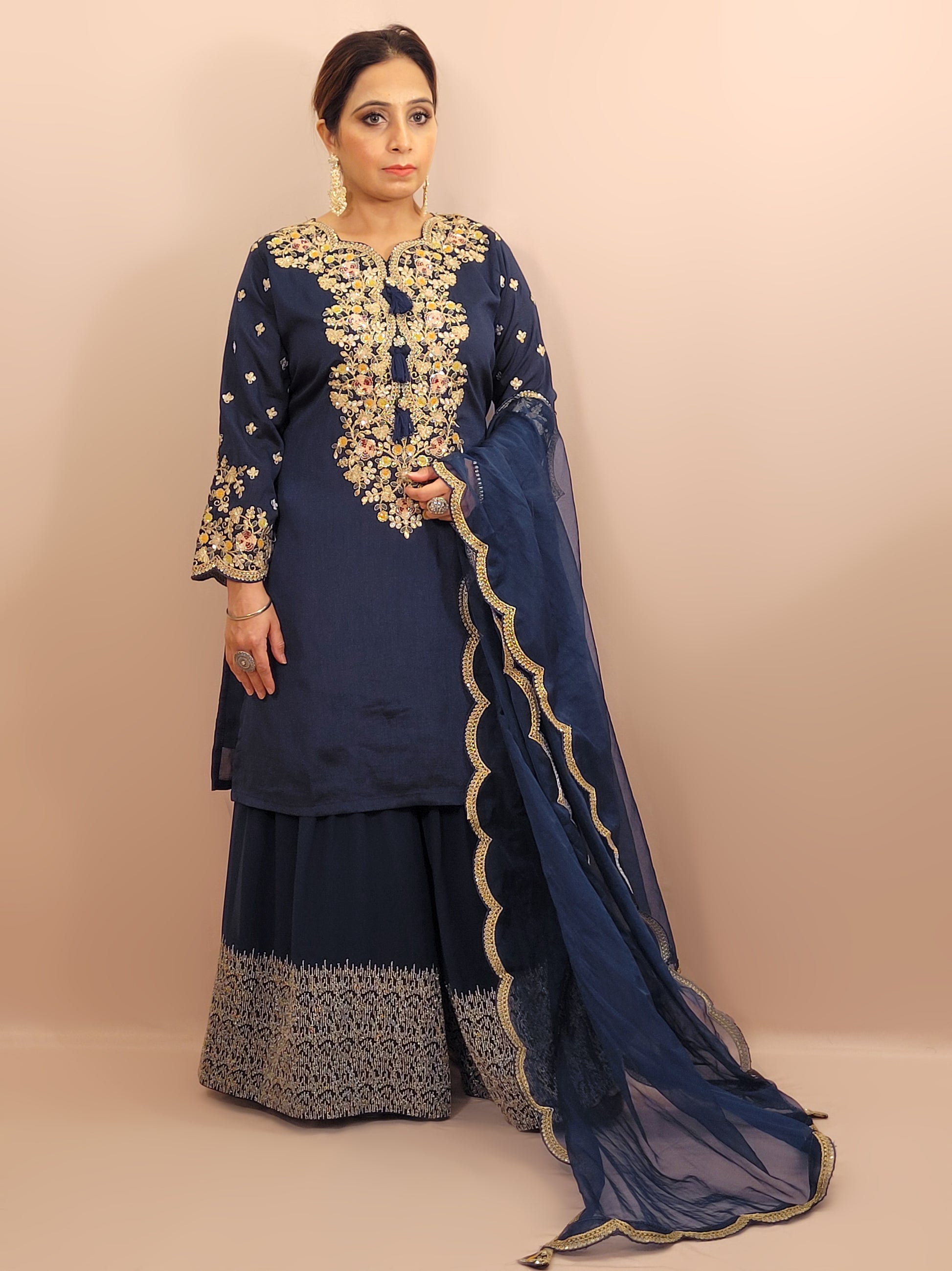 Navy Blue sharara suit with zari, sequins and resham neckline. Bichitra Silk Kameez. Organza Dupatta with Scalloping Border. Georgette Sharara Work.