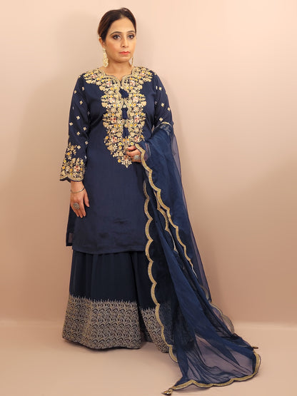Navy Blue sharara suit with zari, sequins and resham neckline. Bichitra Silk Kameez. Organza Dupatta with Scalloping Border. Georgette Sharara Work.