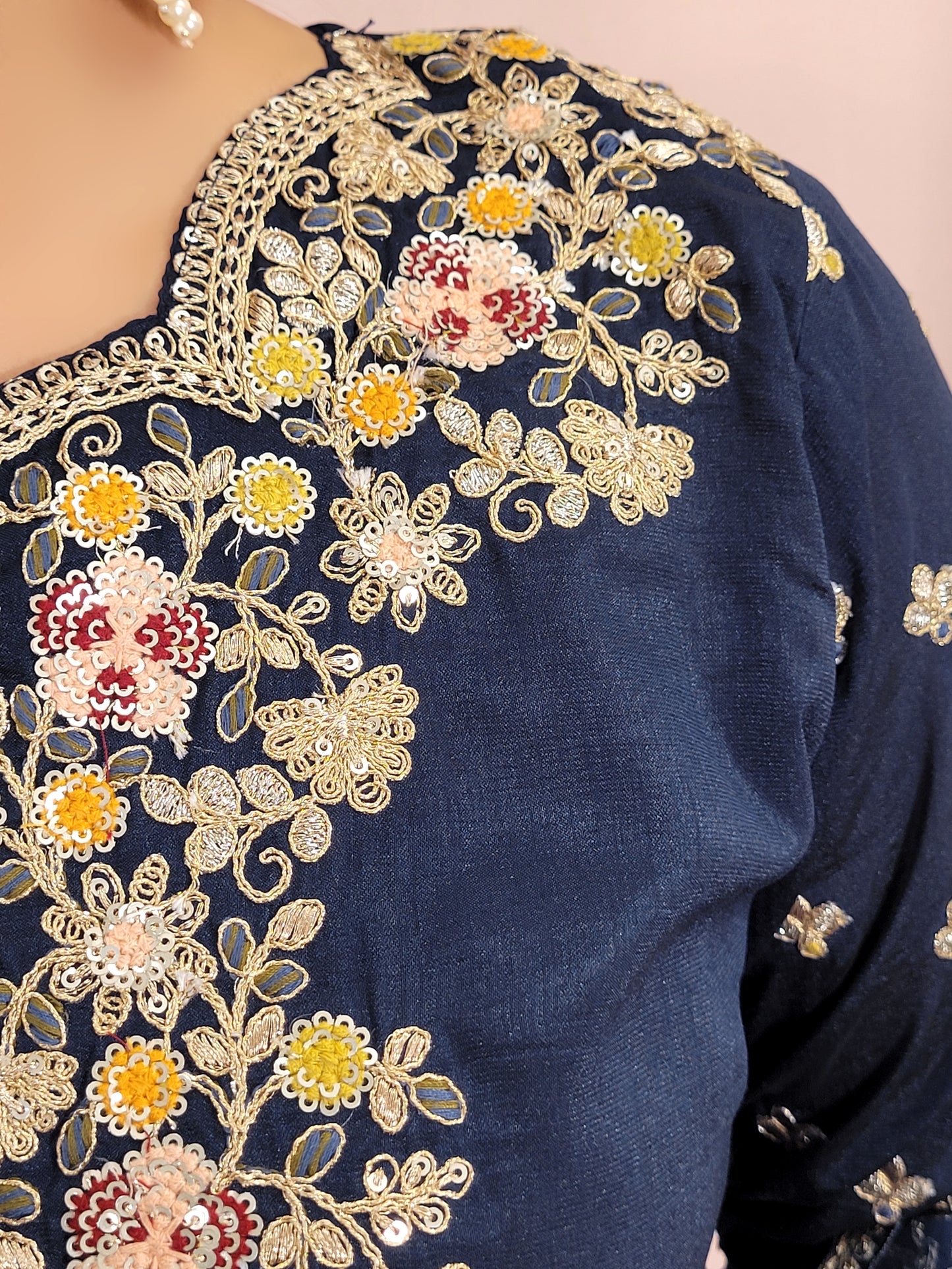 Navy Blue sharara suit with zari, sequins and resham neckline. Bichitra Silk Kameez. Organza Dupatta with Scalloping Border. Georgette Sharara Work.