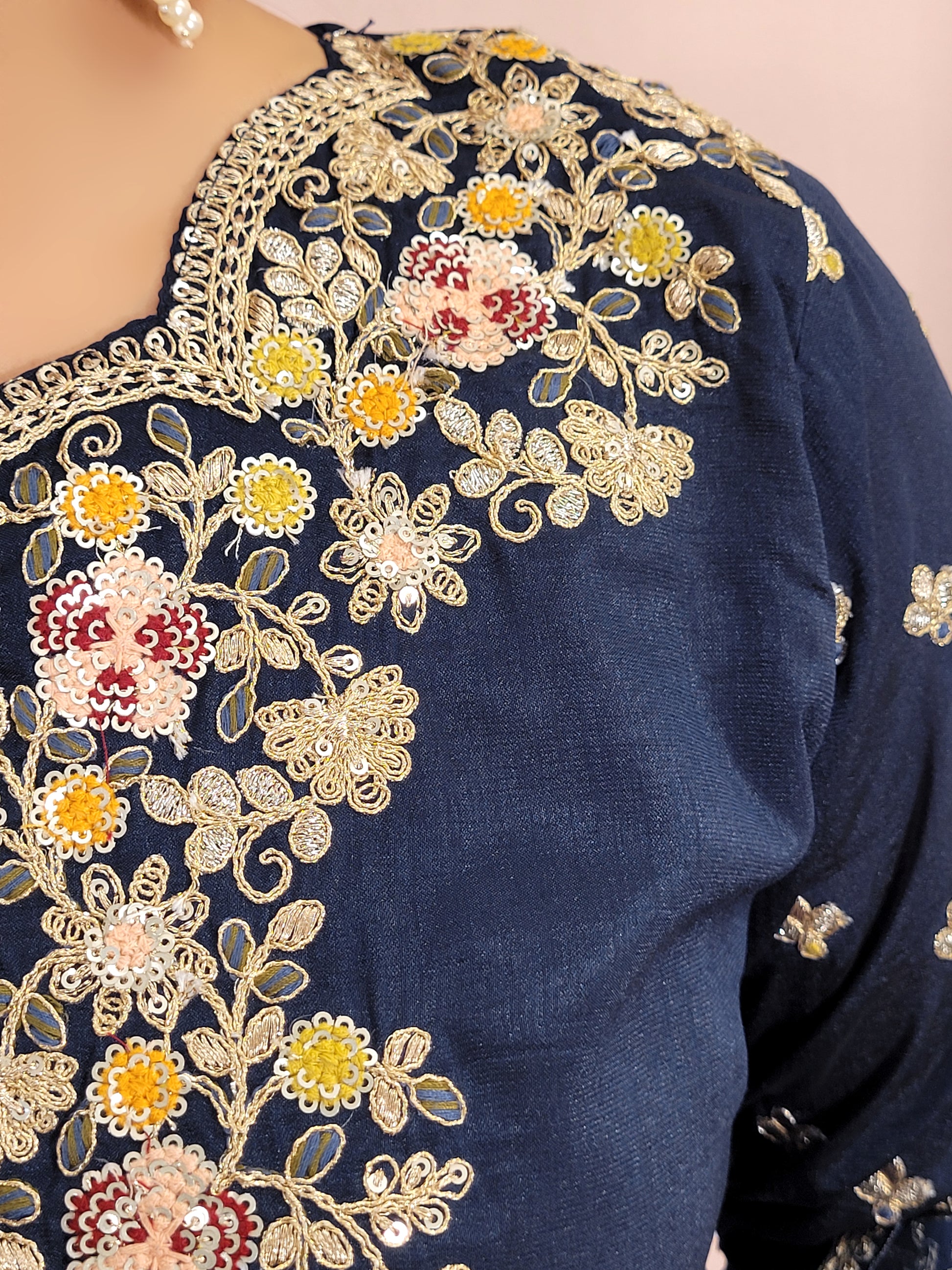 Navy Blue sharara suit with zari, sequins and resham neckline. Bichitra Silk Kameez. Organza Dupatta with Scalloping Border. Georgette Sharara Work.