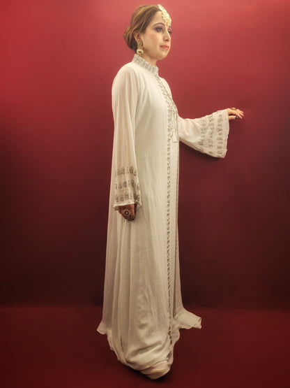 Introducing our latest Indo-Western Palazzo Dress, crafted from high-quality georgette fabric in a light sky blue color with intricate bead work, perfect for party wear and festive occasions. The palazzo pants are designed with a modern and trendy style, giving you the perfect balance of style and comfort. Order yours today and stand out from the crowd at your next special occasion.