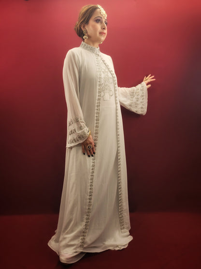 Introducing our latest Indo-Western Palazzo Dress, crafted from high-quality georgette fabric in a light sky blue color with intricate bead work, perfect for party wear and festive occasions. The palazzo pants are designed with a modern and trendy style, giving you the perfect balance of style and comfort. Order yours today and stand out from the crowd at your next special occasion.