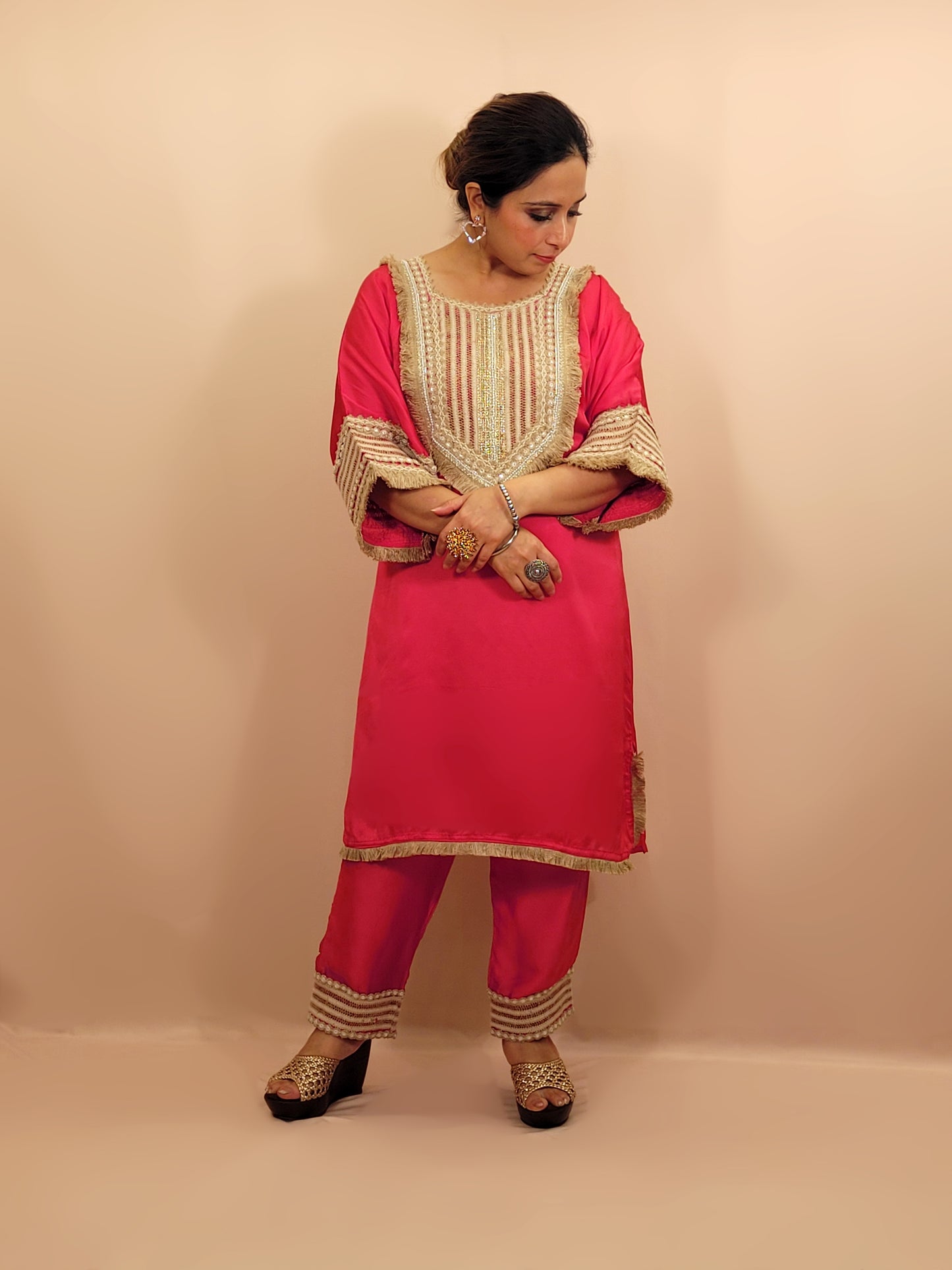 Rani Pink Satin Indowestern Dress with beautiful laced neck, sleeves and pants.