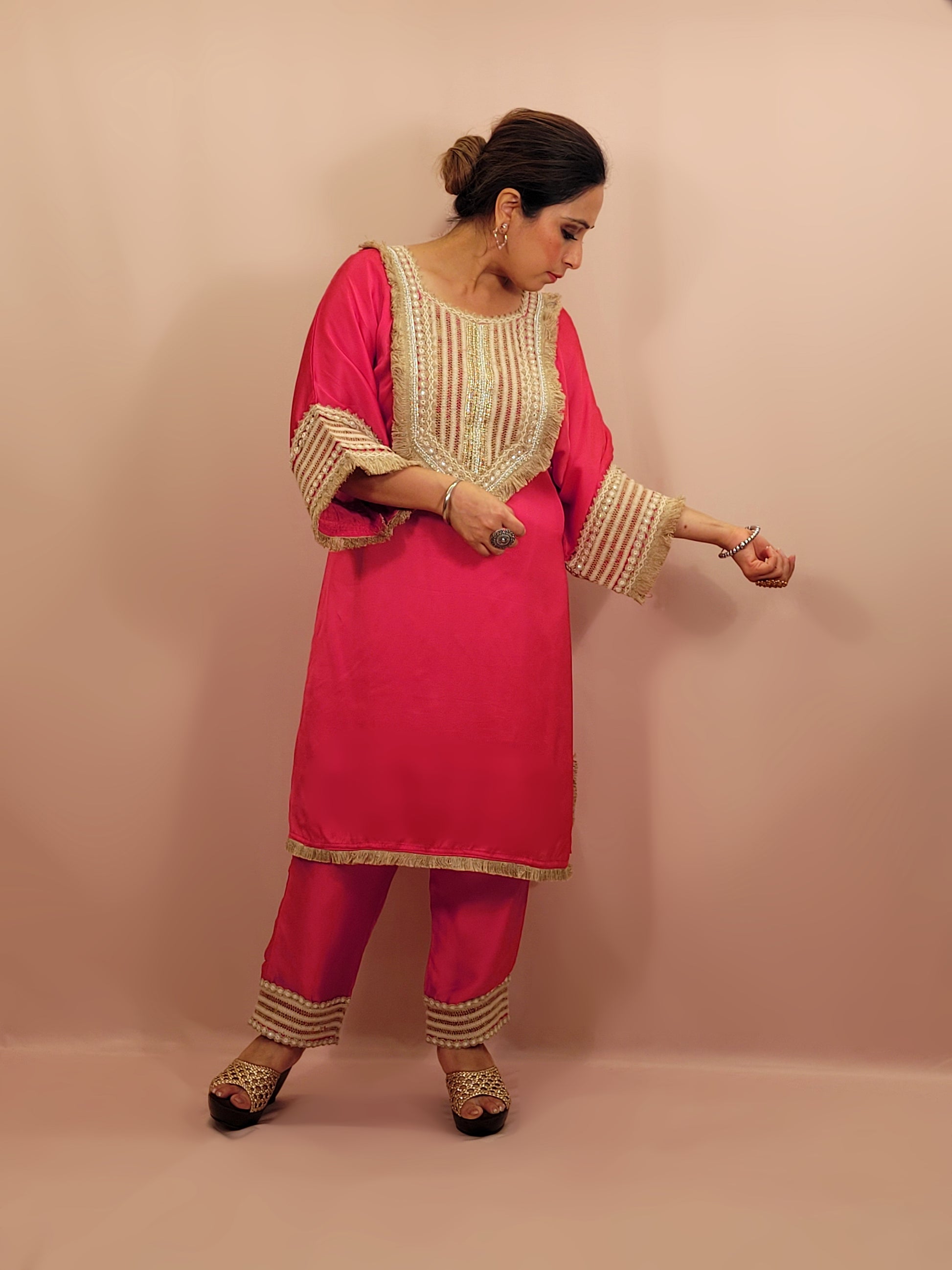 Rani Pink Satin Indowestern Dress with beautiful laced neck, sleeves and pants.